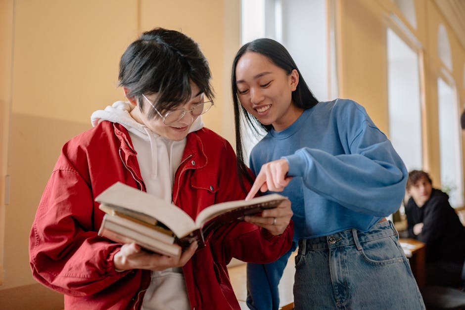 Young students collaborating and smiling
