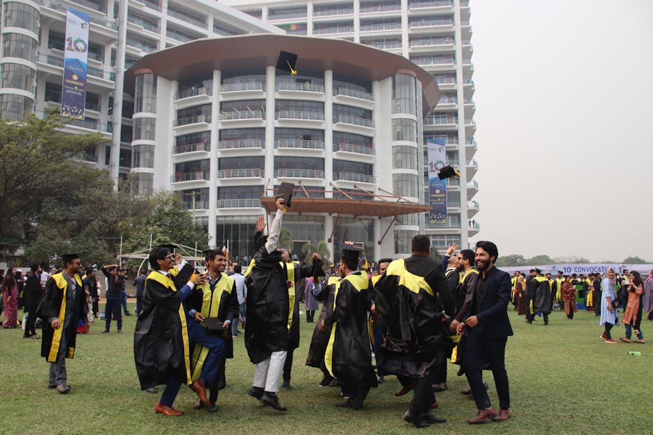 Joyful graduates celebrating outside a m