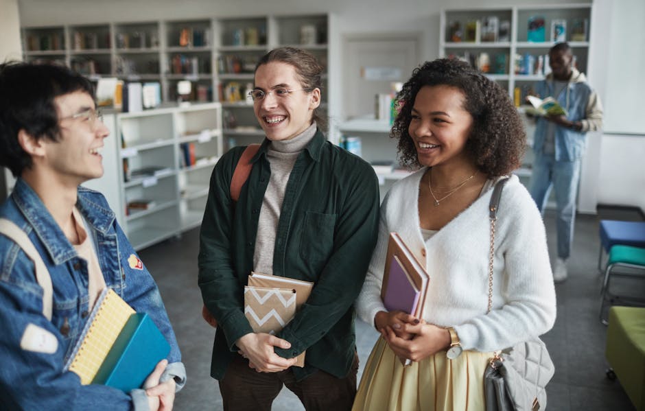 Group of diverse students laughing and h