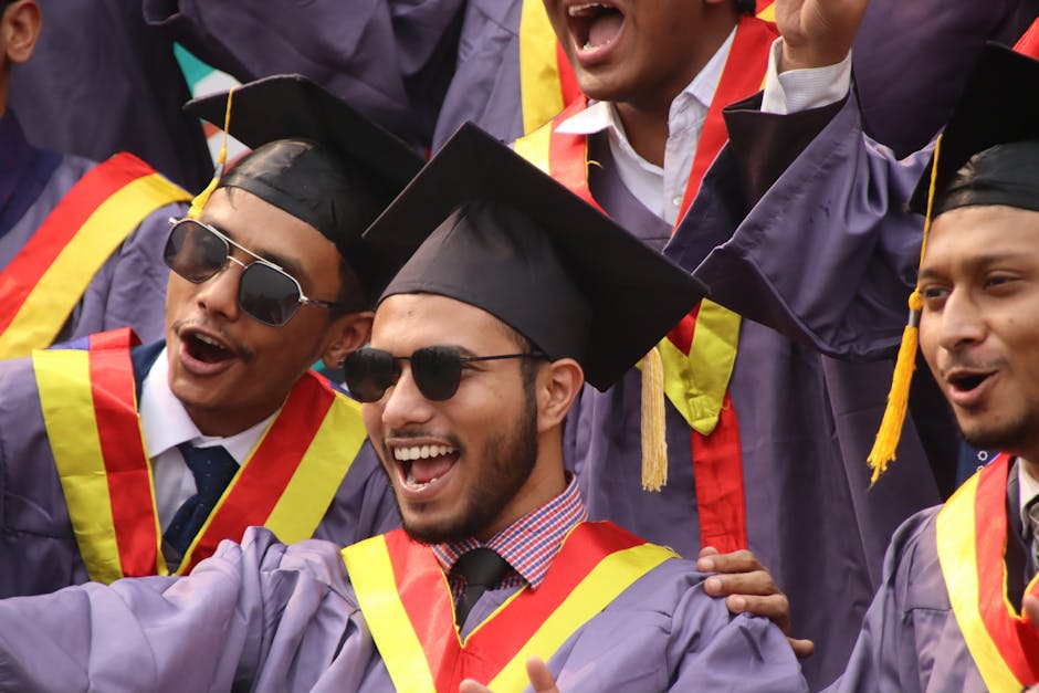 Group of diverse graduates celebrating w