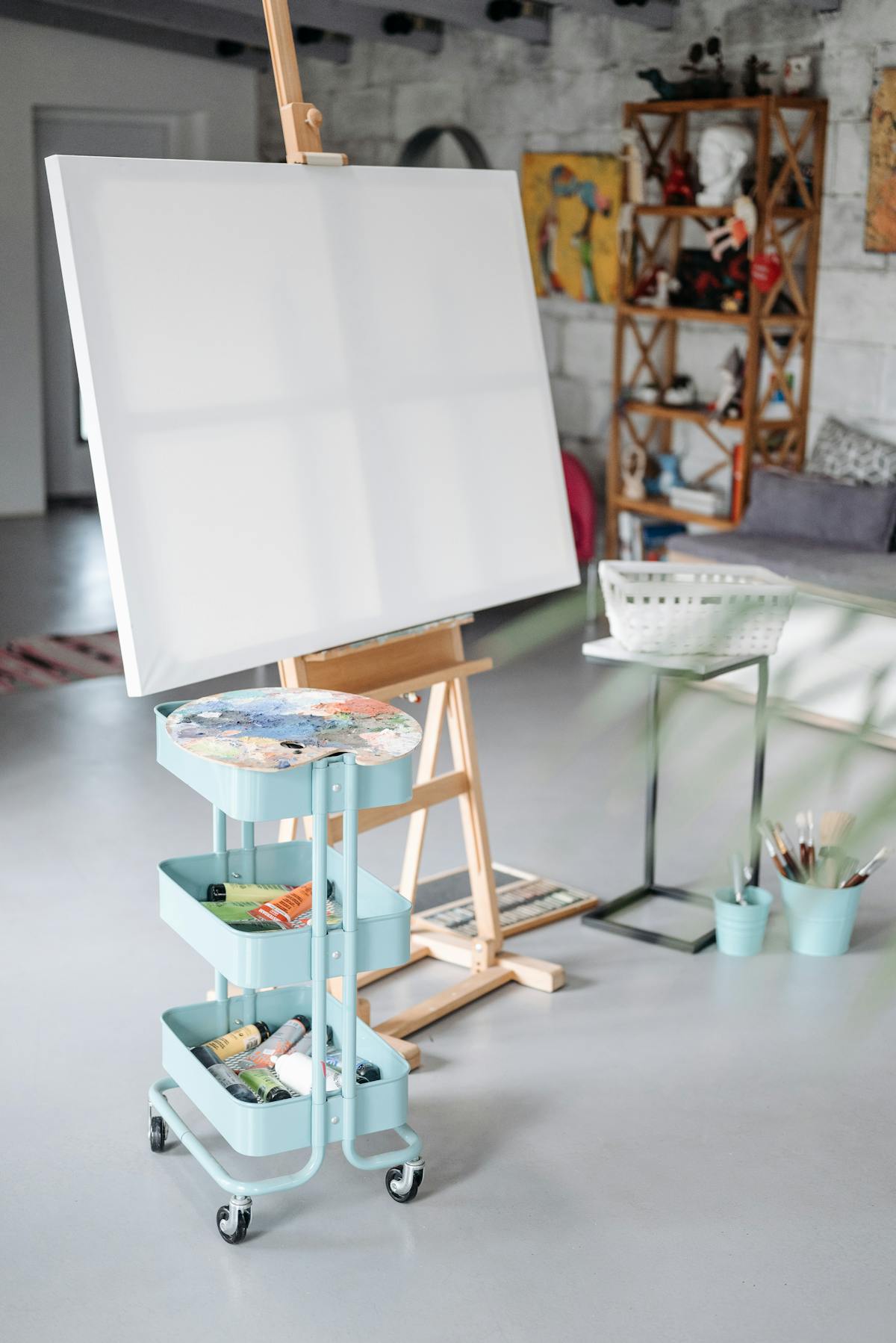 Art and design studio with an easel and painting supplies