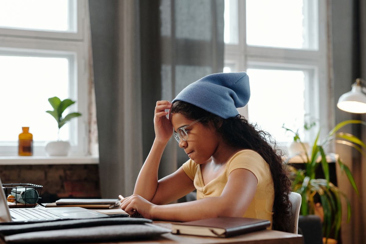 Student taking a test on a laptop