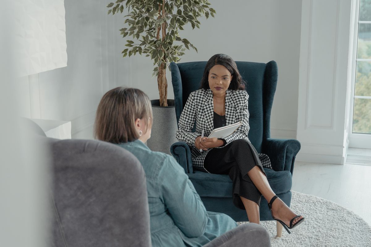 Two people in a face-to-face speaking interview